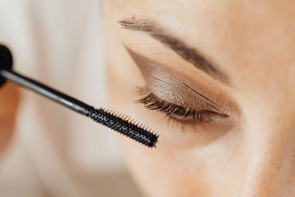 A Woman Applying Mascara