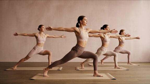 Photo Of Women Stretching Together