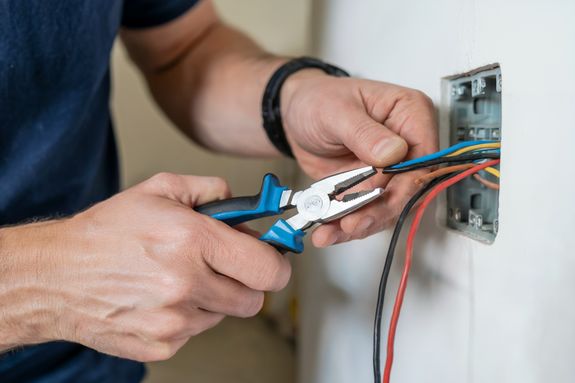 Modern hardware and structured cabling system with patch cords inserted into patch panel outlets