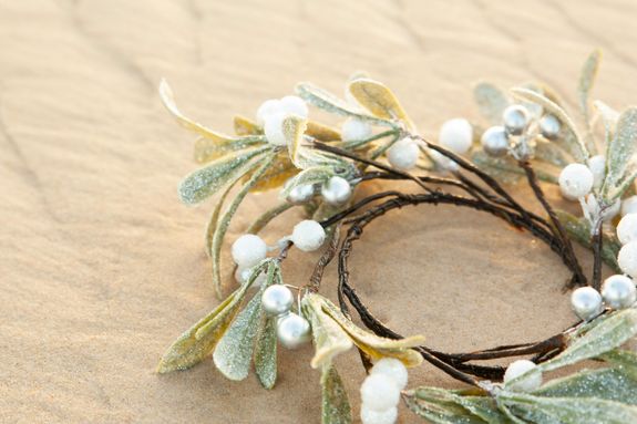 A Mistletoe Wreath on Sand