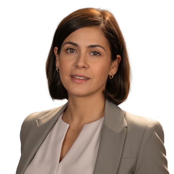 Blonde Woman Working on Laptop in Home Office