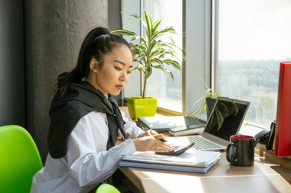 A Woman Working in the Office