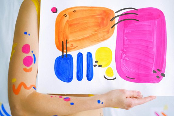 Arm Holding Paper with Painting
