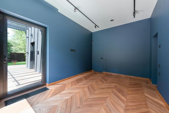 An Empty Room with Blue Walls