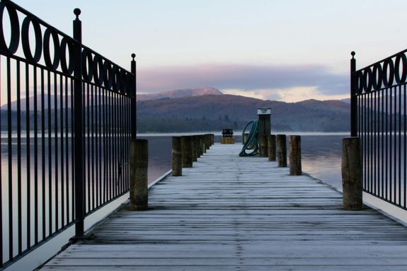 Gray Wooden Boat Dock on Body of Water