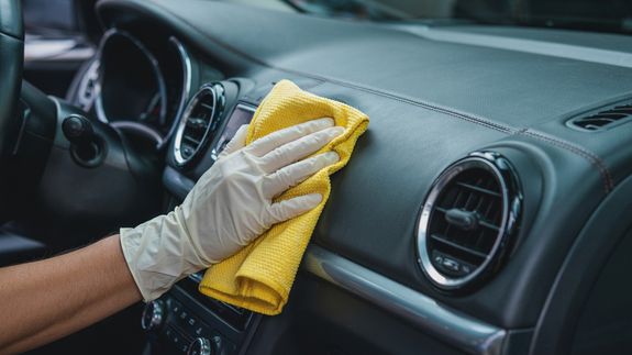 Person Waxing a Car