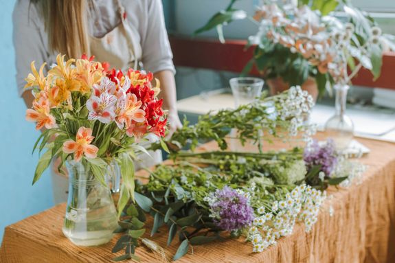 Stems of Colorful Flowers on the Table