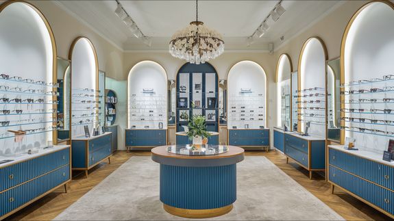 From above of fashion glasses with optical lenses for vision correction in metal shells together with pair in plastic tortoise shell placed on white table