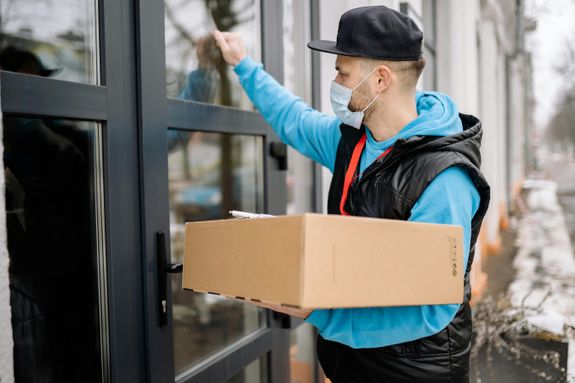 Delivery Man Knocking on a Door