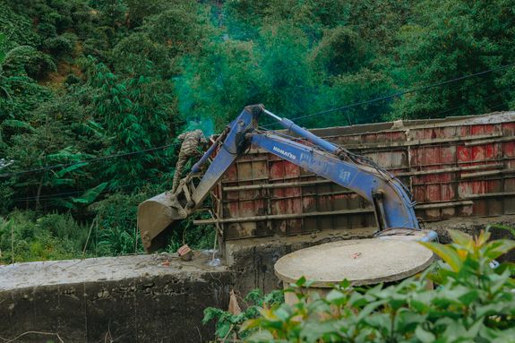 What happens to the debris after land clearing?