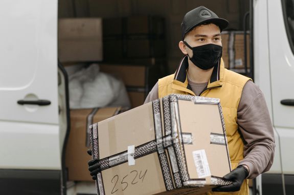 A Man Carrying a Package