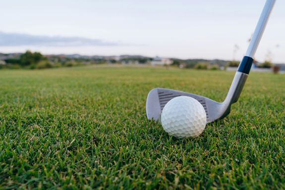 Close-up Shot of a Golf Ball on the Grass
