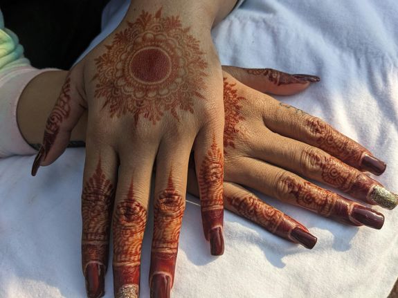 Henna Tattoos on Woman Hands