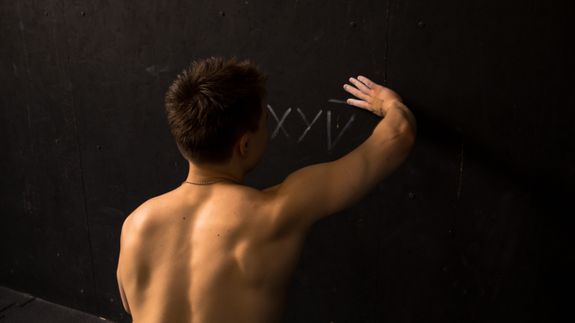 A Woman Supervising an Elderly Woman Exercise