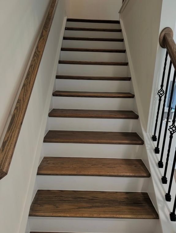 person in blue gloves holding white textile