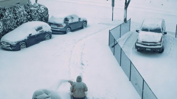 Man Putting Trash on the Truck 