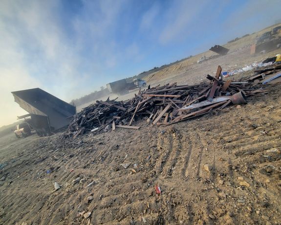 Are there any items that cannot be placed in the dumpster?