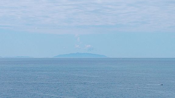 White Sail Boat On Sea