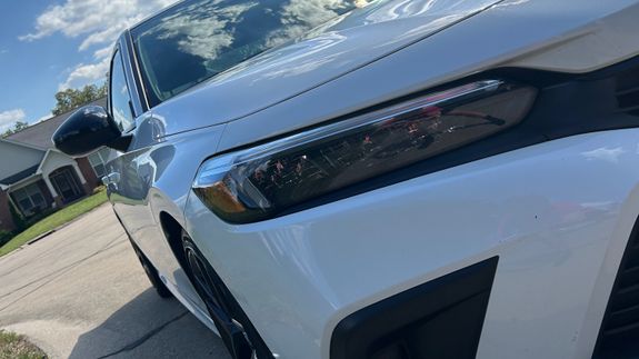 A Close-Up Shot of a Car being Washed