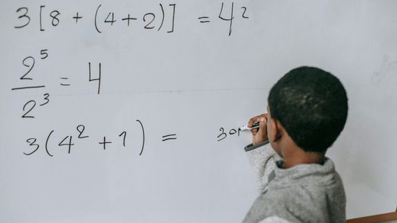Woman Working At Home Using Her Laptop