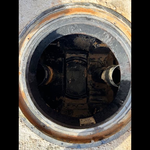 What is a grease trap and how does it work?