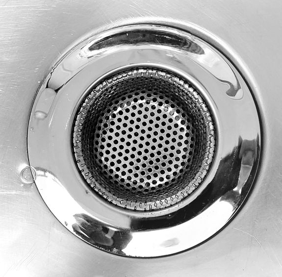 How can I prevent clogged drains in my home?