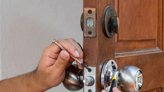 Close-up Photography of Gray Stainless Steel Door Lever and Lock