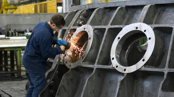 Man Welding in Factory